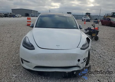 2023 Tesla Model Y из США, поврежденный, VIN 7SAYGAEE4PF673333